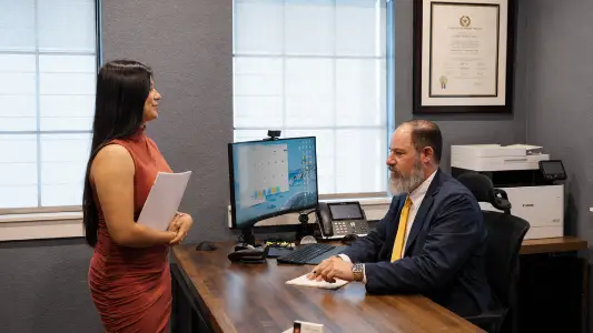 Attorneys reviewing a contract agreement